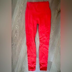 Fabletics orange/red athletic Leggings with pockets